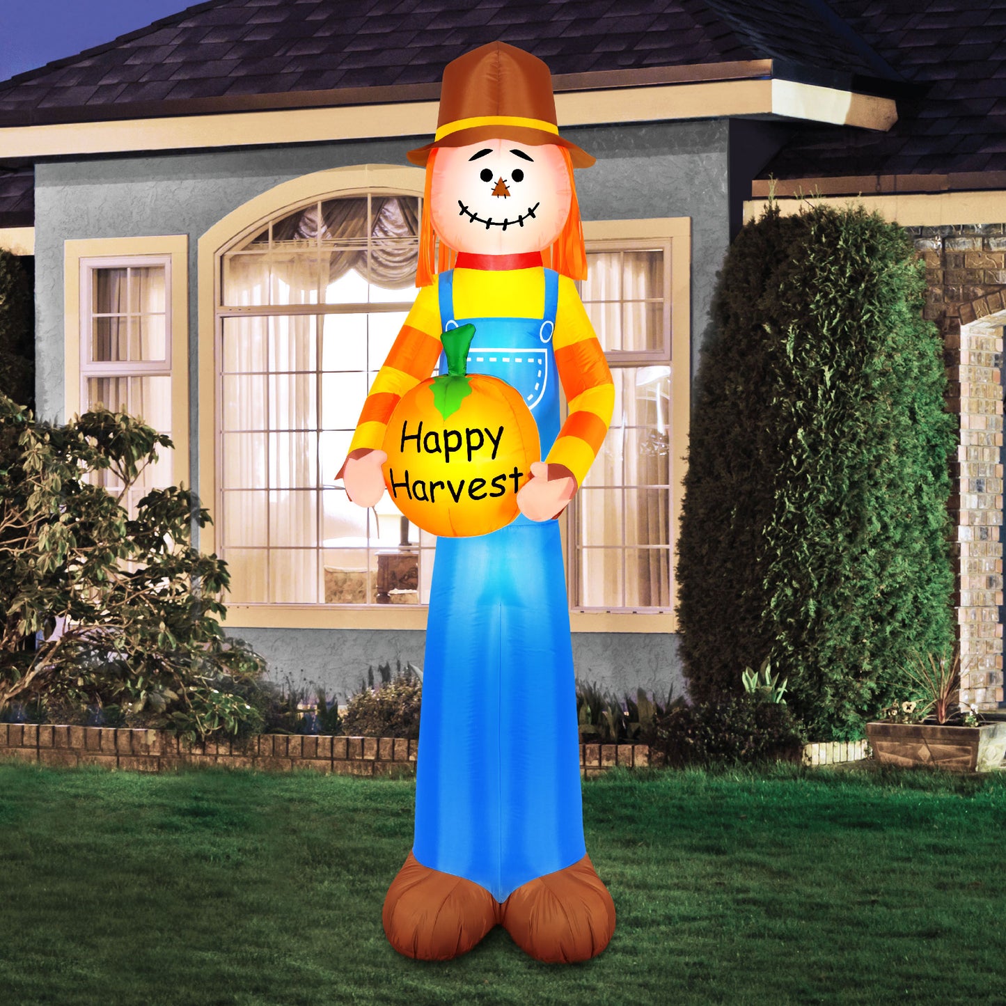 Occasions Airflowz Inflatable Harvest Scarecrow Holding Pumpkin, 2 ft Tall, Multicolored lifestyle