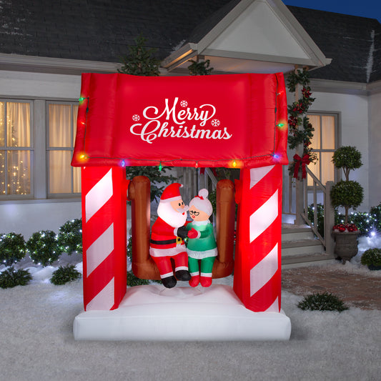 Animated Christmas Inflatable Mr. and Mrs. Claus on Swing, 7 ft Tall lifestyle