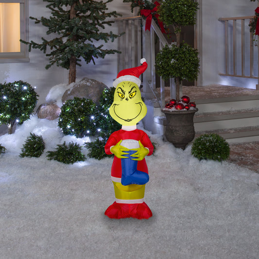 4-Ft Grinch with Blue Stocking Christmas Inflatable lifestyle