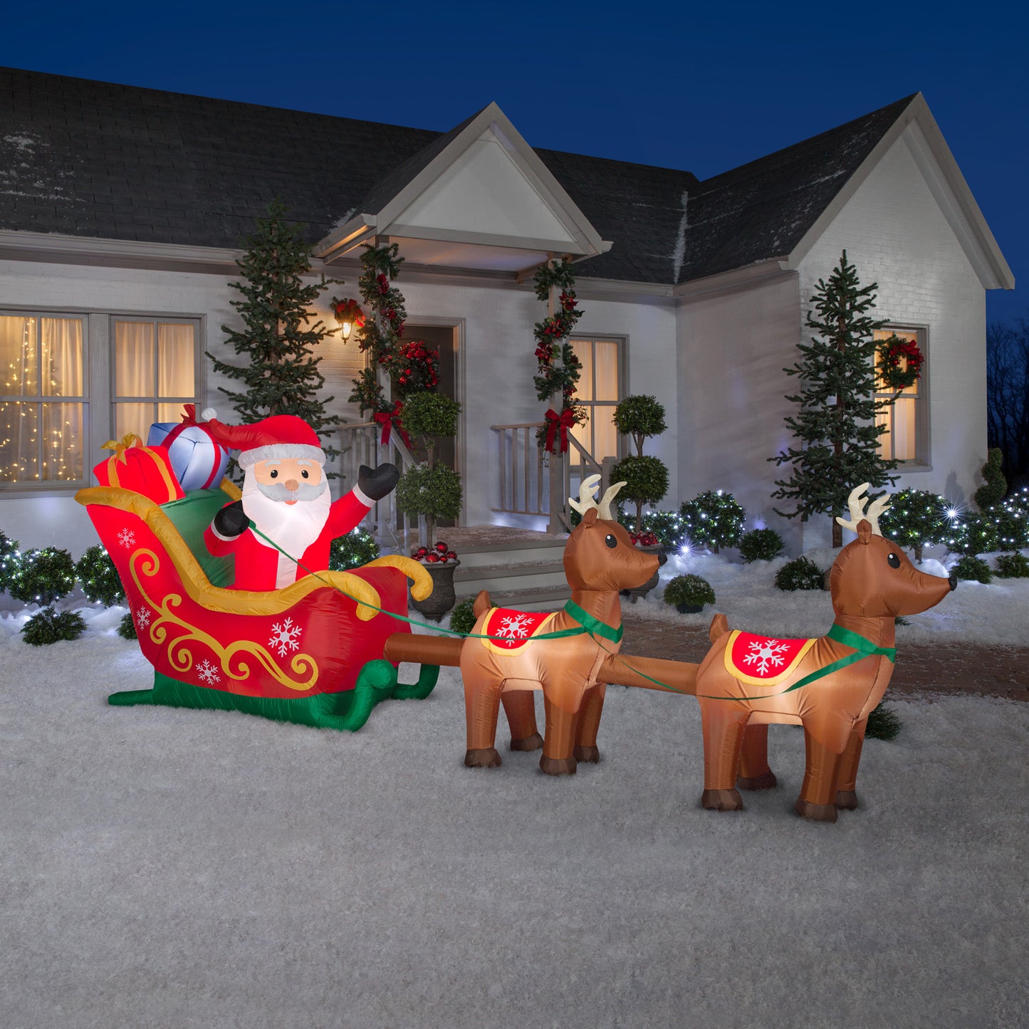 12.5' Wide Santa and Sleigh w/ Reindeer Scene Christmas Inflatable lifestyle