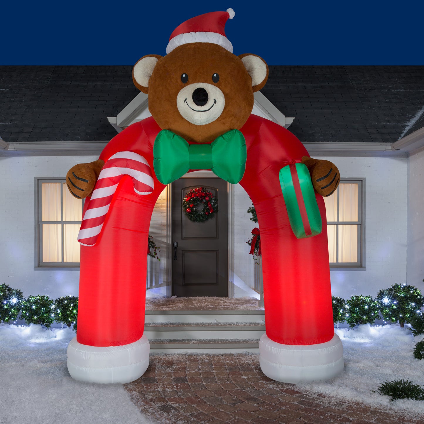 10.5' Archway Animated Wiggling Bear and Bow Tie Christmas Inflatable lifestyle