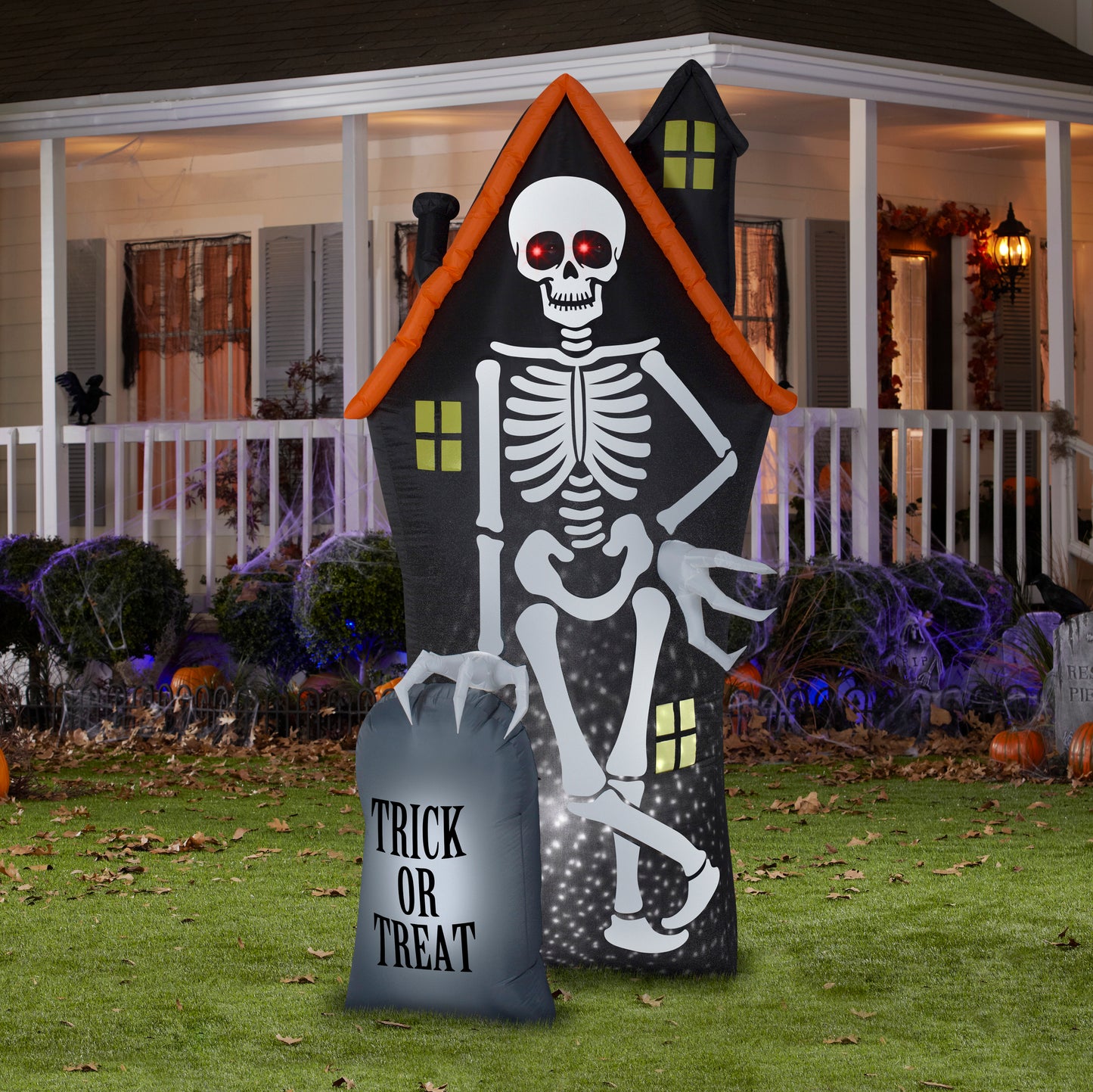 8' Projection Skeleton and Haunted House Tombstone Scene Halloween Inflatable lifestyle