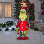 Load image into Gallery viewer, Gemmy Christmas Airblown Inflatable Grinch Holding String of Stockings, 6.5 ft Tall, Red
