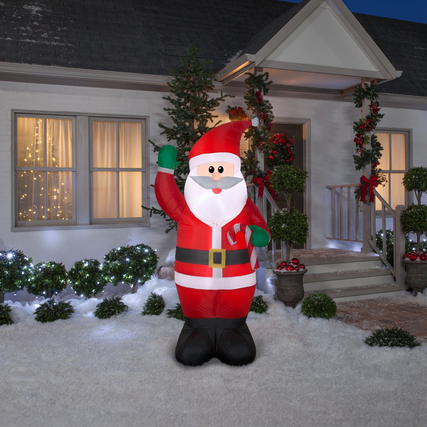 6.5' Santa Holding a Candy Cane Christmas Inflatable lifestyle