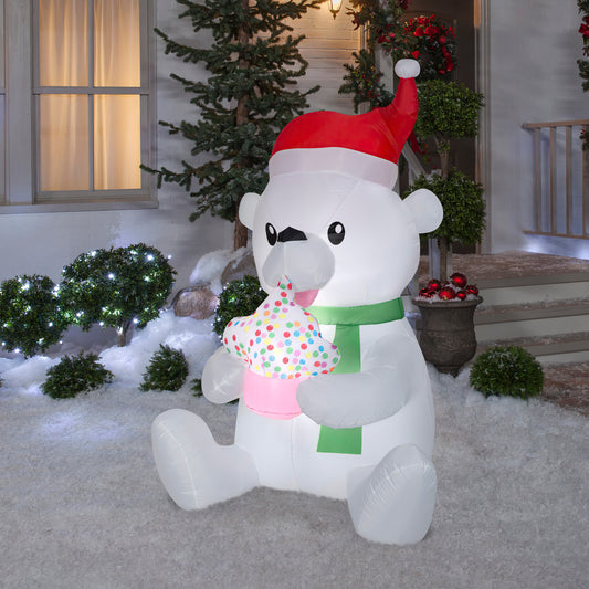 5.5' Animated Inflatable Nom Nom Polar Bear w/Cupcake lifestyle