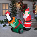 Load image into Gallery viewer, Gemmy Lightshow Airblown Inflatable Santa and Penguin Cannon Scene w/Sparkle LED, 5.5 ft Tall
