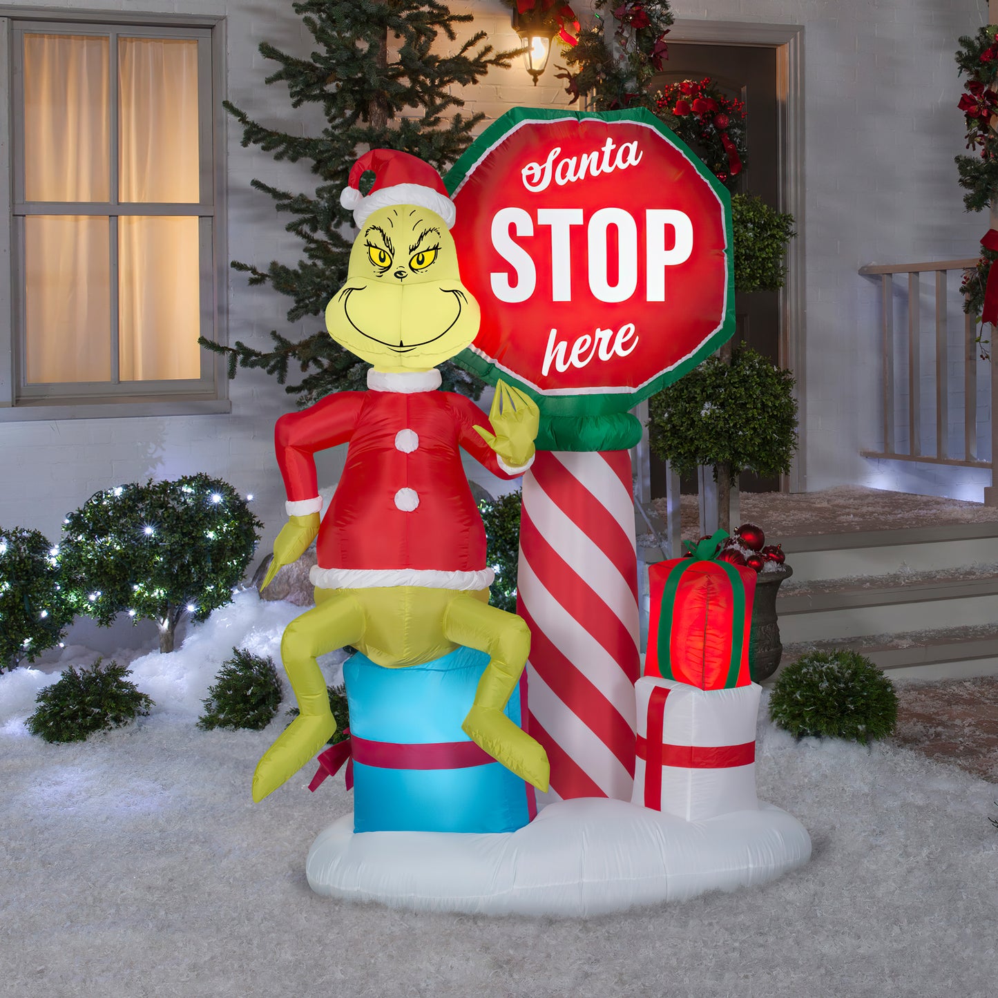 6' Inflatable Grinch w/Santa Stop Here Sign w/LEDs Scene lifestyle