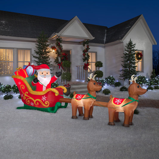 12.5' Wide Santa and Sleigh w/ Reindeer Scene Christmas Inflatable lifestyle