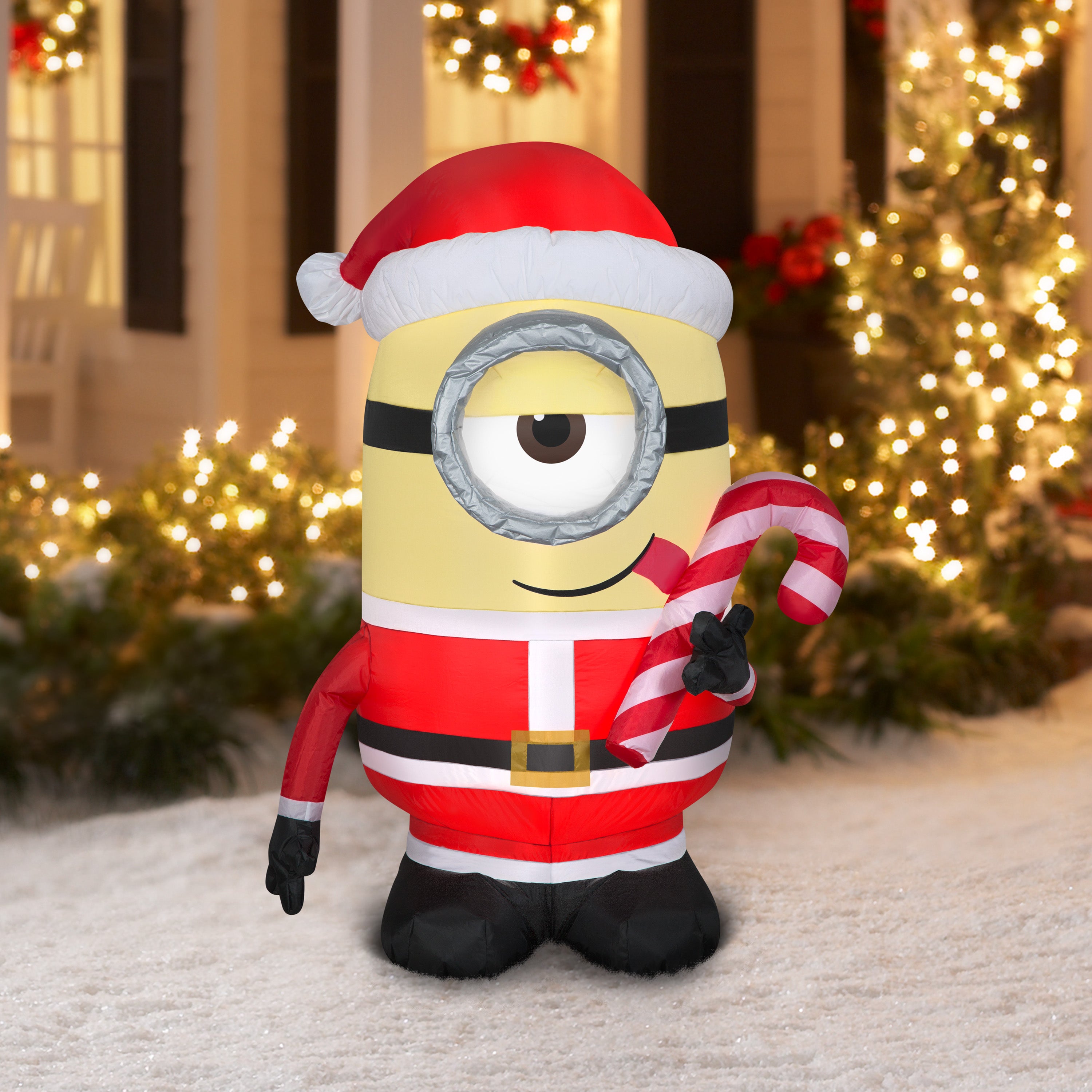 Gemmy Christmas Airblown Inflatable Inflatable Minion Stuart Licking Candy Cane, 4.5 ft Tall, yellow