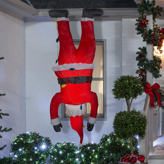 Christmas Inflatable 6.5' Upside Down Hanging Santa lifestyle