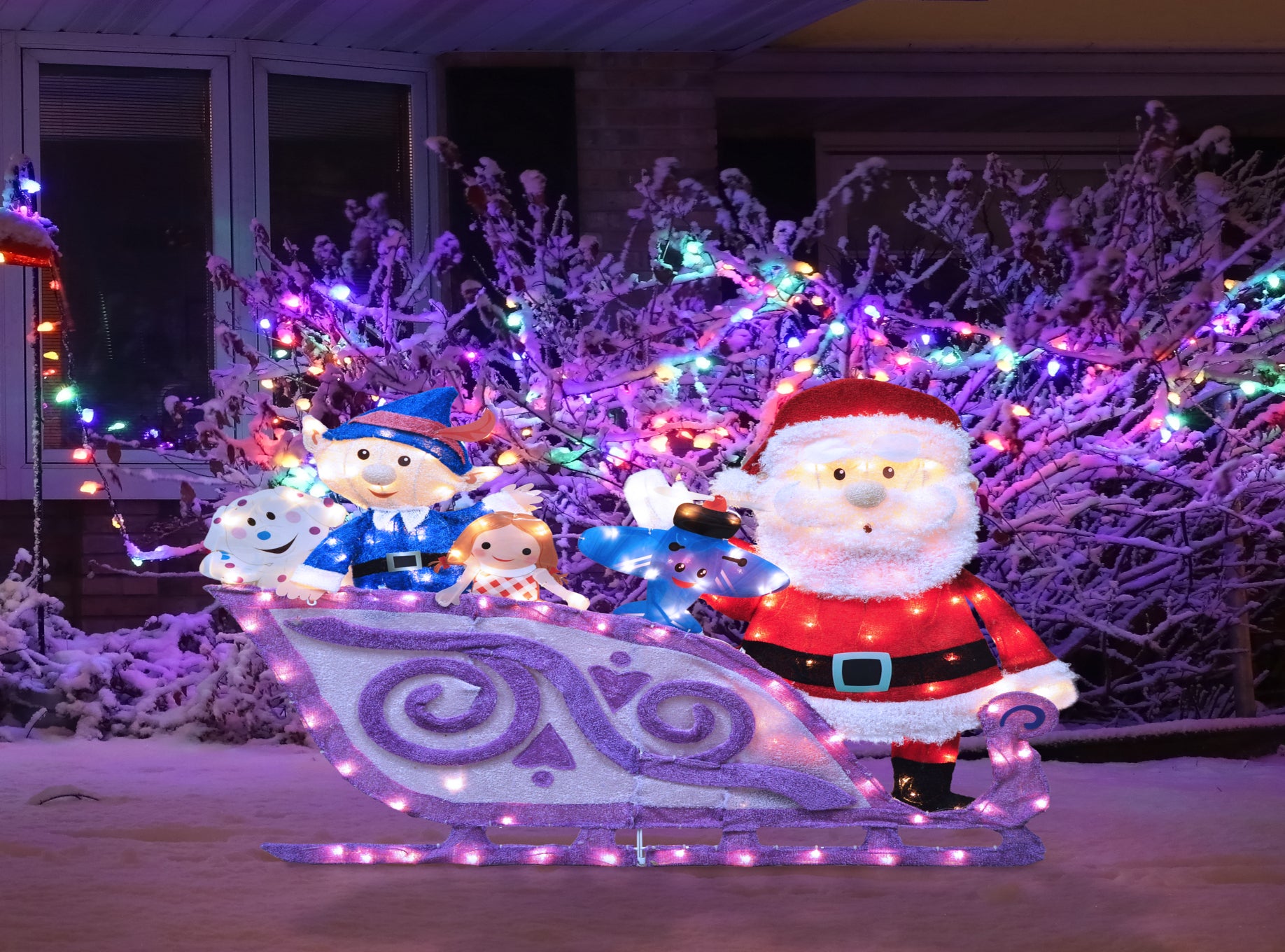 Rudolph the Red-Nosed Reindeer 42-Inch Wide Rudolph Santa and Sleigh 2D Pre-Lit Yard Art Christmas Décor