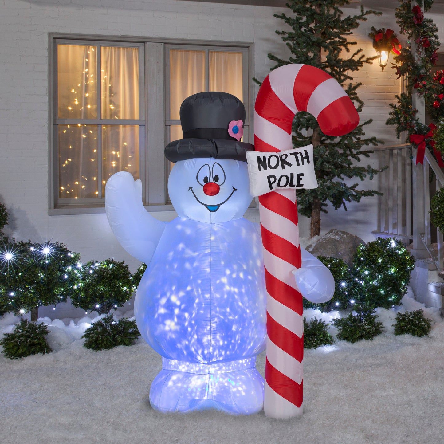 5.5' Projection Kaleidoscope Frosty Hugging North Pole Sign lifestyle