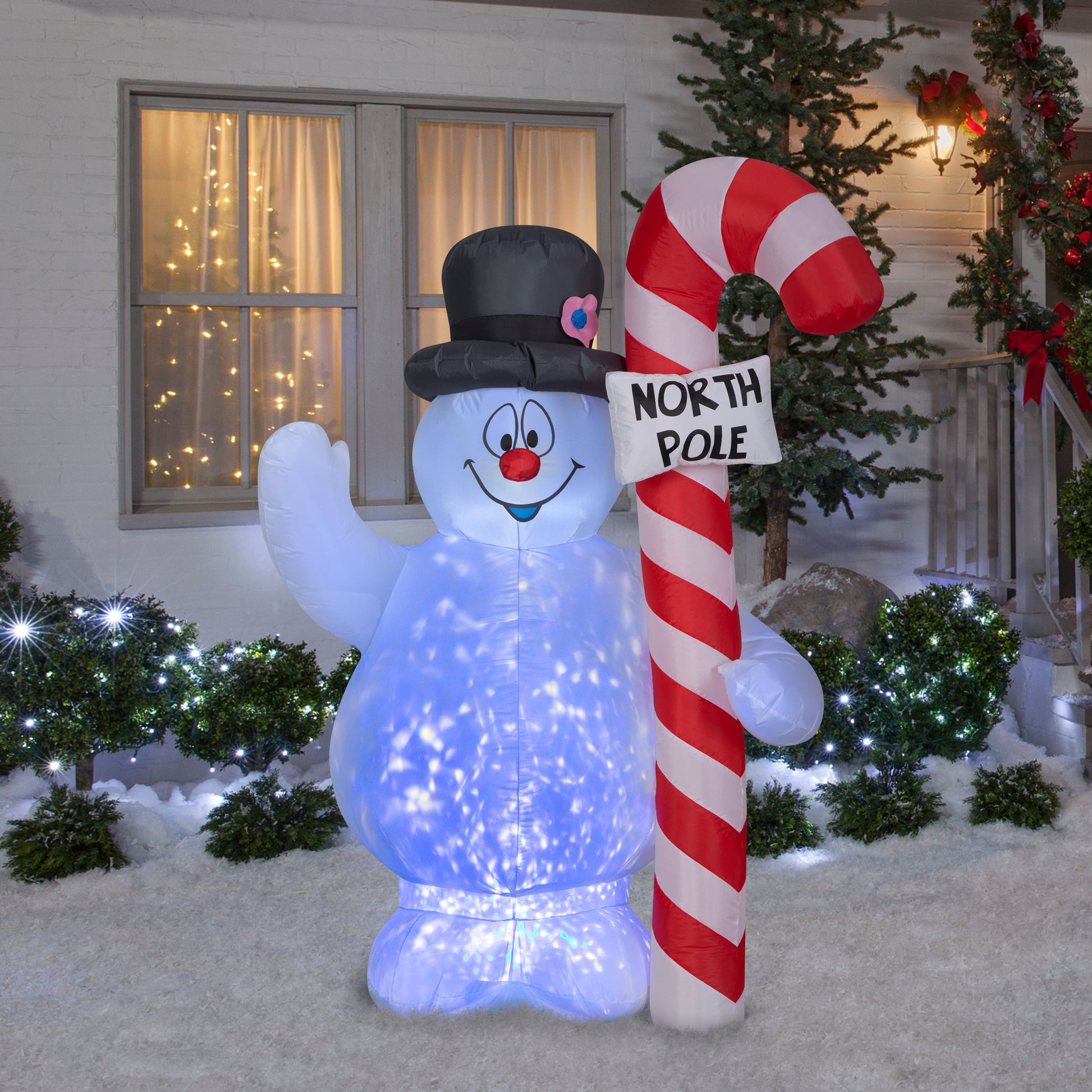5.5' Projection Kaleidoscope Frosty Hugging North Pole Sign lifestyle