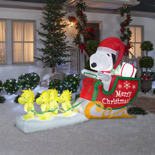 8' Inflatable Snoopy as Santa in Sleigh Scene lifestyle