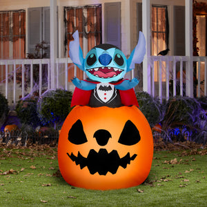 Gemmy Animated Airblown Inflatable Vampire Stitch Popping Out of Pumpkin Disney, 5 ft Tall, Multicolored