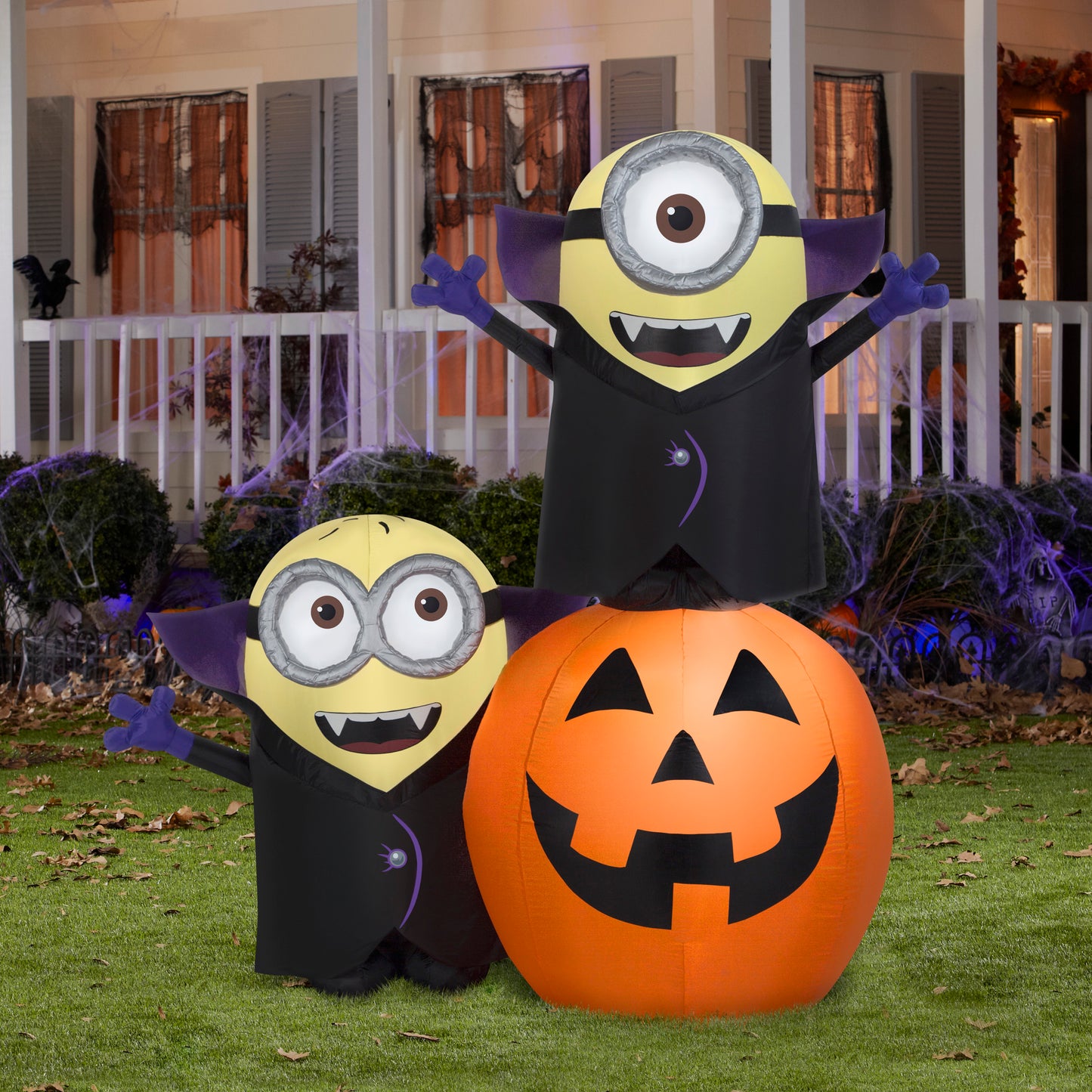 6.5' Gone Batty Minions w/ Pumpkin Halloween Inflatable Scene lifestyle