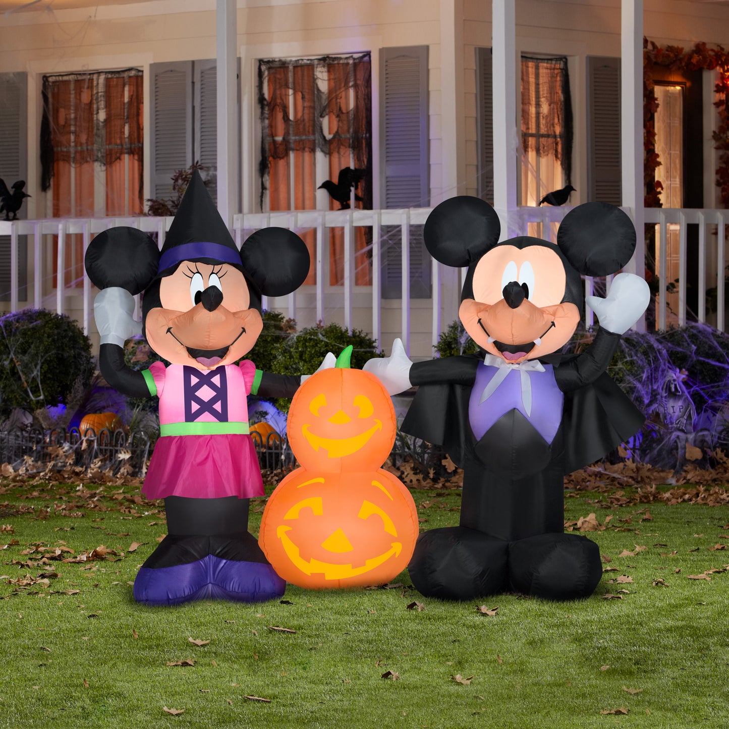 5.5' Wide Mickey and Minnie w/Pumpkins Scene Disney Halloween Inflatable lifestyle