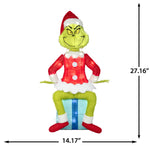 Load image into Gallery viewer, Gemmy Dr. Seuss The Grinch Sitting On Present Tinsel Yard Sculpture, 27-Inch, Pre-Lit LED Christmas Decor
