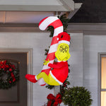Load image into Gallery viewer, Gemmy Christmas Inflatable Hanging Grinch with Candy Cane, 4.5 ft Tall, Multi
