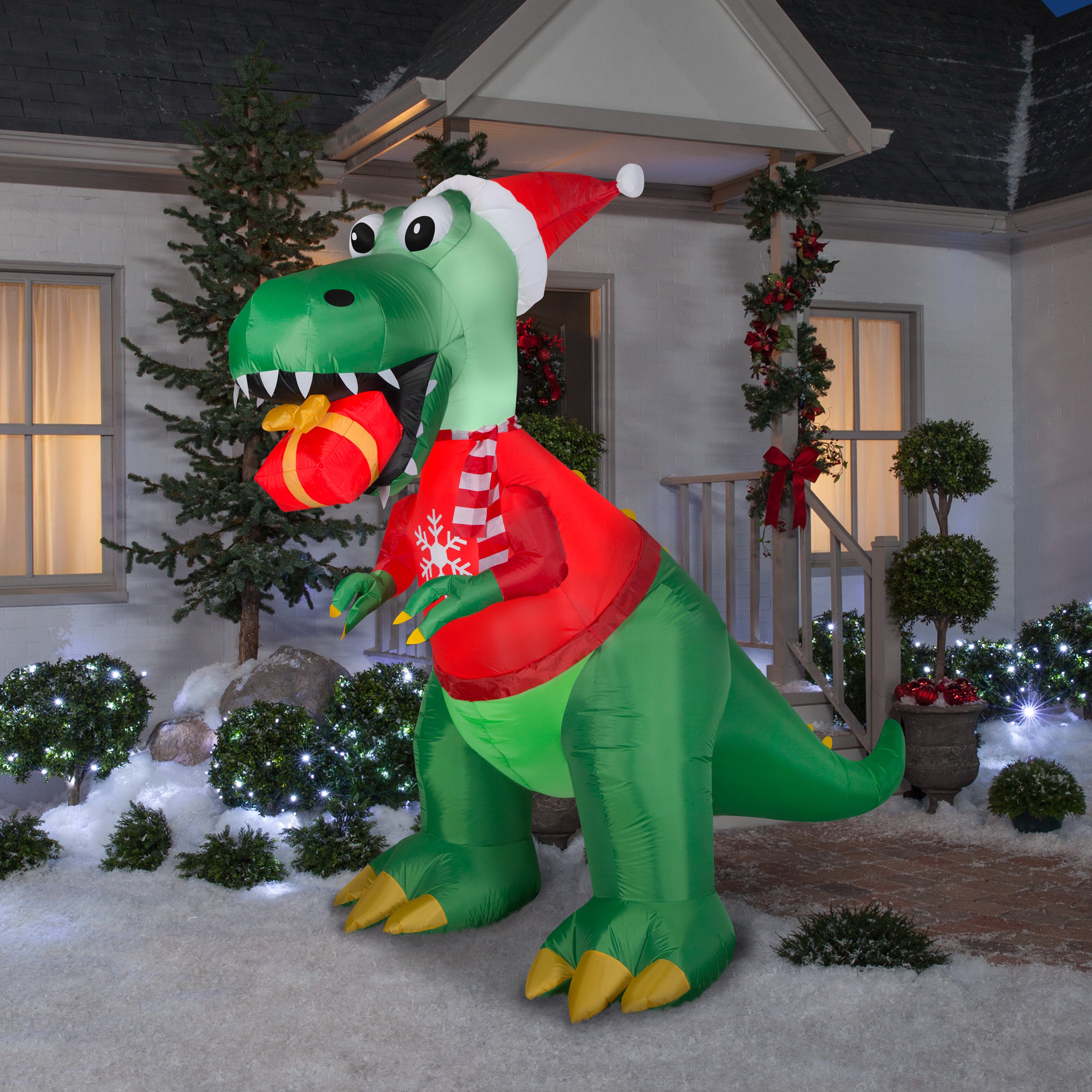 Gemmy Christmas Airblown Inflatable T Rex w/Gift, 7.5 ft Tall, Green