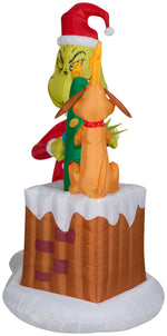 Load image into Gallery viewer, Gemmy Animated Airblown Inflatable Grinch Pulling Tree from Chimney Scene Dr. Seuss, 6.5 ft Tall
