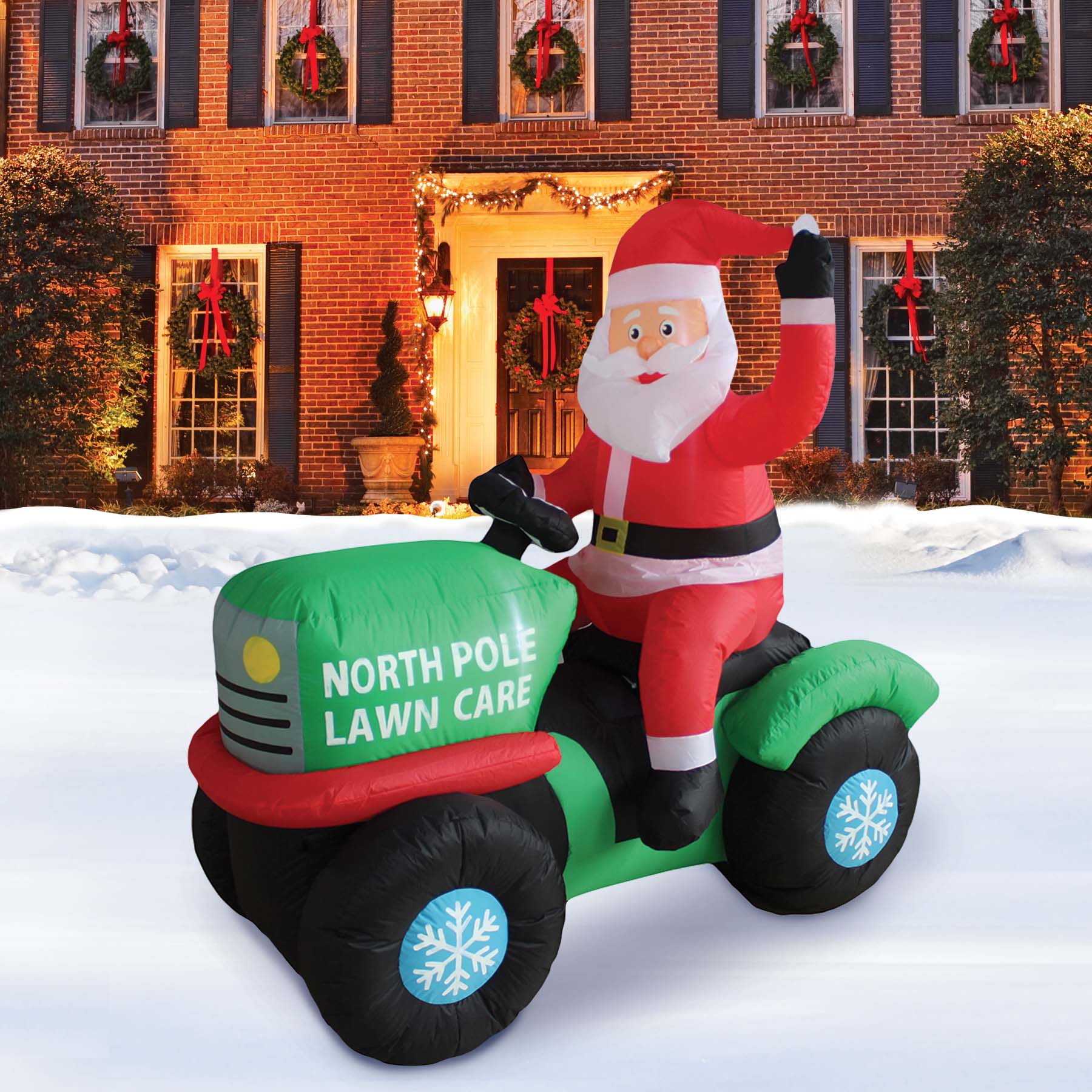 A Holiday Company 5ft Tall North Pole Lawn Care Santa on Lawnmower, 5 ft Tall lifestyle
