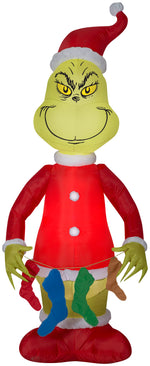 Load image into Gallery viewer, Gemmy Christmas Airblown Inflatable Grinch Holding String of Stockings, 6.5 ft Tall, Red
