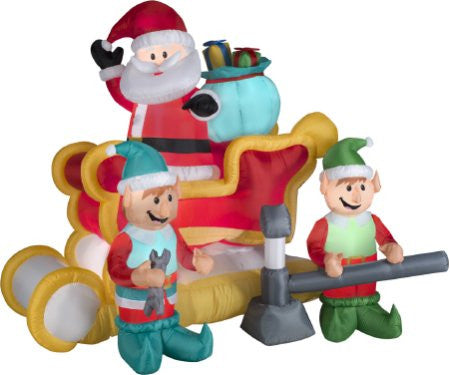 Santa and his elves in sleigh airblown